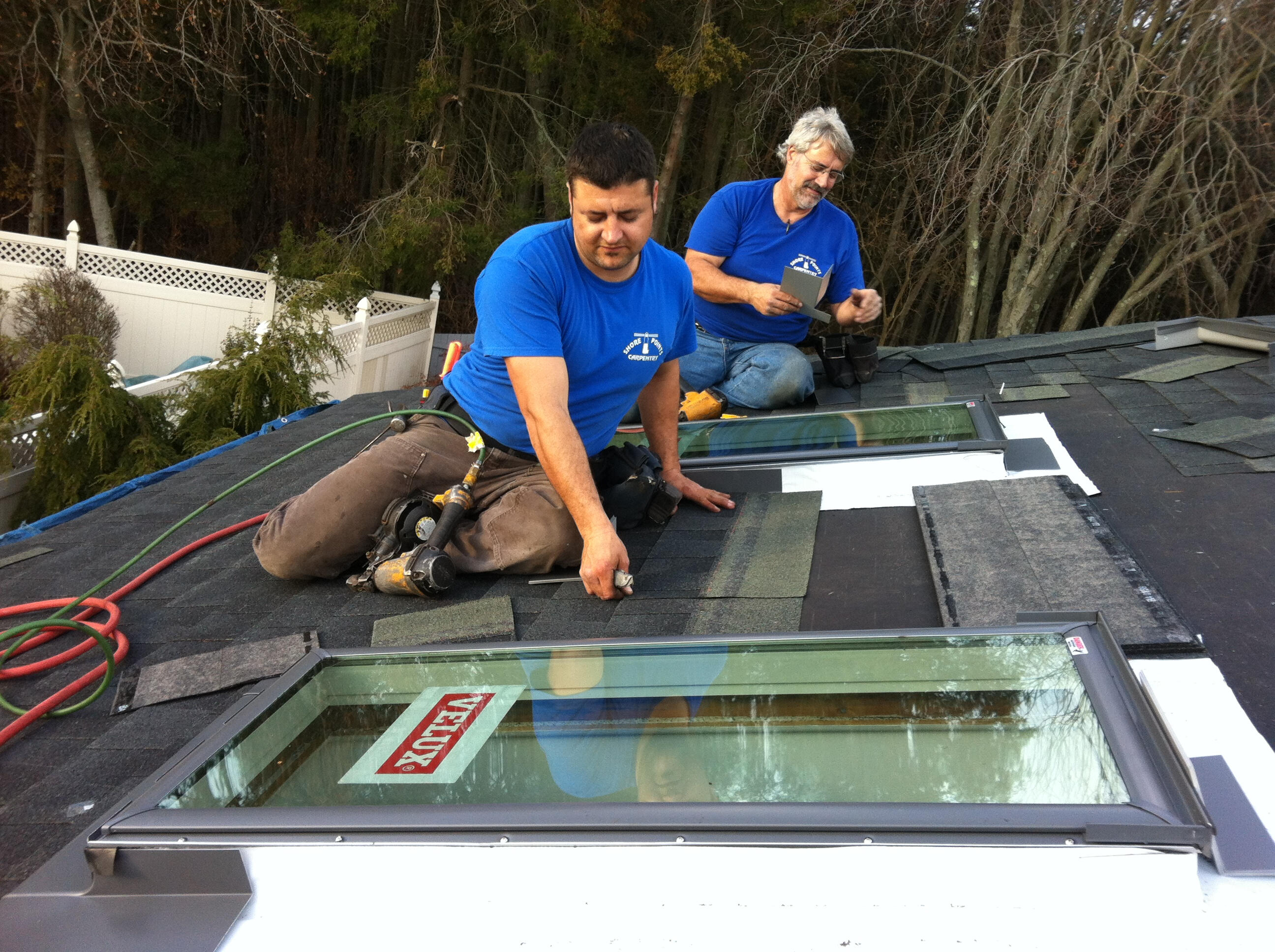 Larry and his son installing Velux skylights Larry and his son installing Velux skylights
